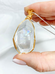 Enchanted Clear Quartz Gold Wrapped Rainbow Pendant