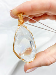 Enchanted Clear Quartz Gold Wrapped Rainbow Pendant