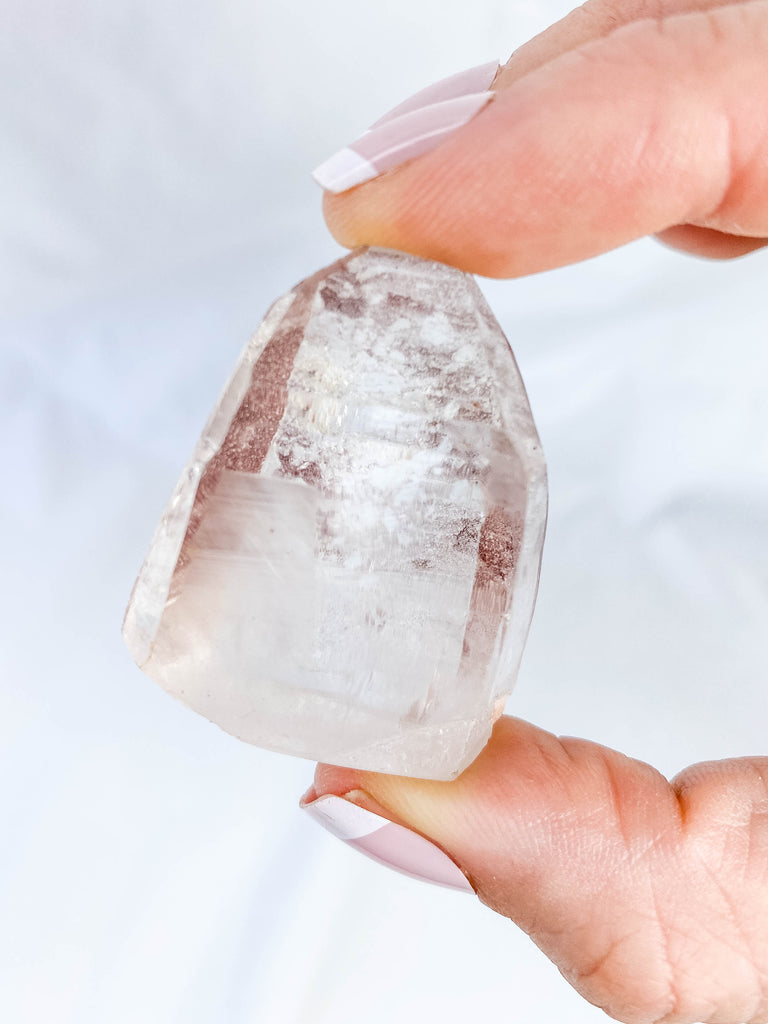 Clear Quartz with Inclusions Half Polished Point 35g