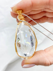 Enchanted Clear Quartz Gold Wrapped Rainbow Pendant