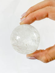 Clear Quartz Sun Face Carving