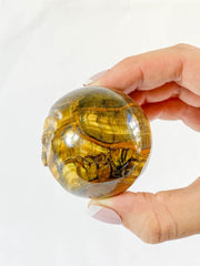 Tiger Eye Sun Face Carving